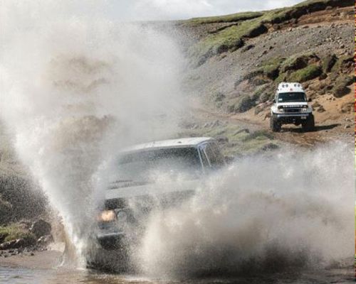 Driving jeeps off roading event Iceland